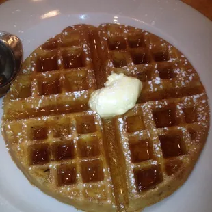 A waffle smothered in butter, with real maple syrup.   Yum!