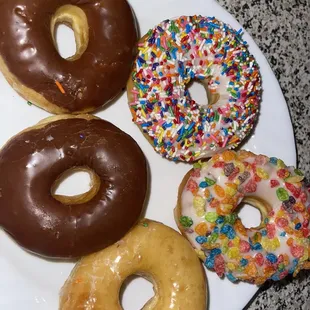 a variety of donuts on a plate