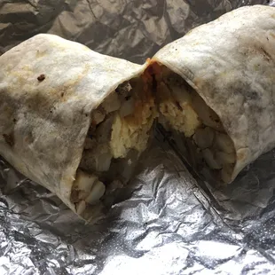 Egg and potatoes inside chipotle sauce
