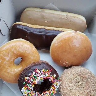 a variety of doughnuts in a box