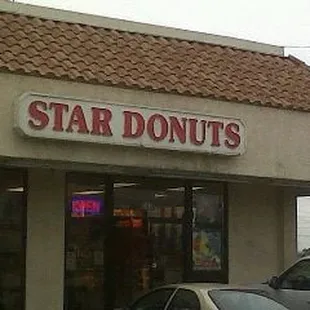 a car parked in front of the store