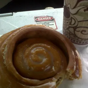 a cup of coffee and a pastry