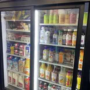 Fridge stocked with staples including eggs, milk