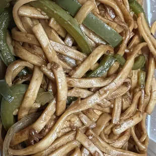 a plate of noodles and vegetables