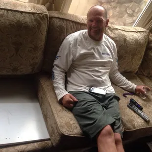 Our great expensive couch from Star Furniture. Isn't my hubby cute??:)