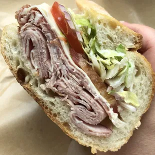 The Classic!  Saturday&apos;s daily sandwich on fresh baguette bread with I think ham, salami, hot coppa, provolone cheese.