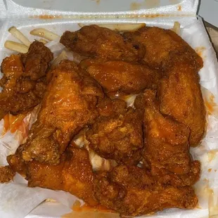 chicken wings in a styrofoam container