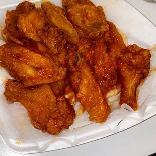 chicken wings in a styrofoam container