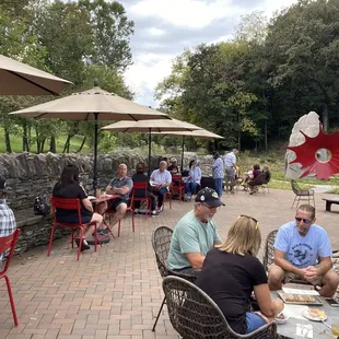 a group of people sitting around a table