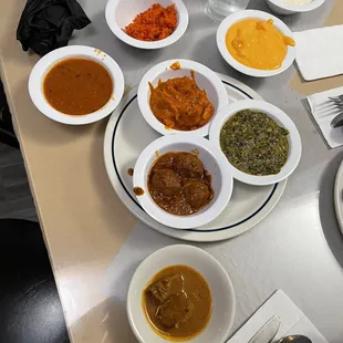 Lamb Vindaloo, Saag Paneer, Chicken Masala, Tomato Soup, Rice Pudding, Mango Pudding, Gajar ka Halwa or Carrot Pudding