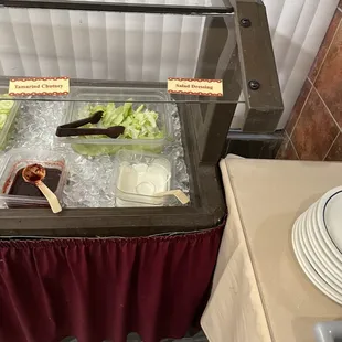 a buffet with a variety of food items