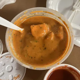 a bowl of soup and sauce