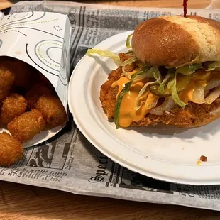 Friend chicken sandwich and tots