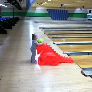 a child playing with a ball