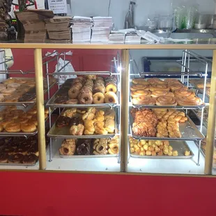 a display case full of doughnuts