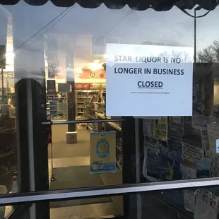 a sign in the window of a store