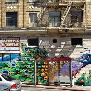 a colorful mural on the side of a building