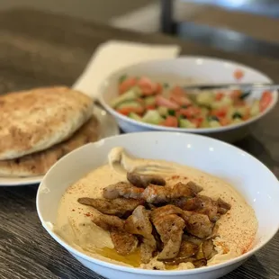 two bowls of food on a table