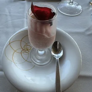 a dessert on a plate with a spoon