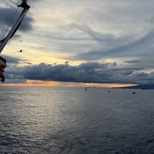 a flag on a boat in the ocean