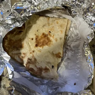 a tortilla wrapped in foil