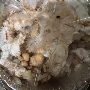 a bowl of ice cream and nuts