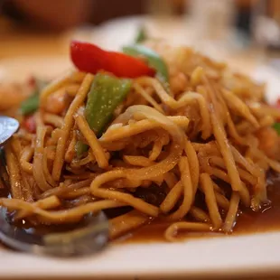 a plate of stir fried noodles