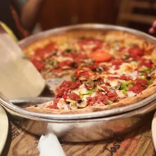 a half eaten pizza on a table