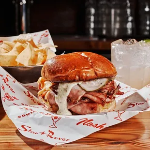 a sandwich and chips on a table
