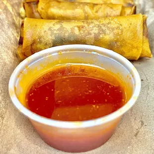 Egg-Rolls w/sweet-n-sour sauce. Cooked to crispy perfection.