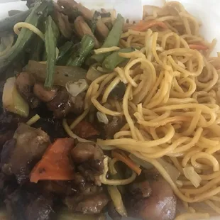a plate of noodles and vegetables