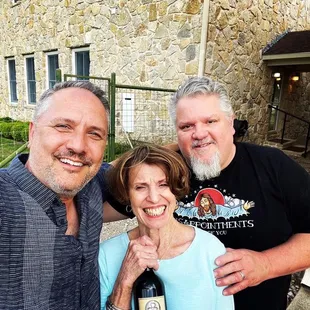 Preparing to open and enjoy a bottle of Brennan Vineyards tribute wine! (Steve Puckett, Trellise Brennan &amp; Steve Harris)