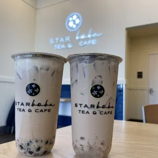 Left: Starboba Milk Tea (Crystal boba, honey boba, crema). Right: Jasmine Milk Tea with Crystal boba.