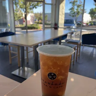 Peach Oolong fruit tea with boba