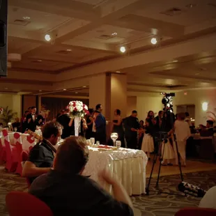 To the left is a live band playing for the guests of this wedding.