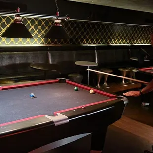 a pool table with a pool ball on it