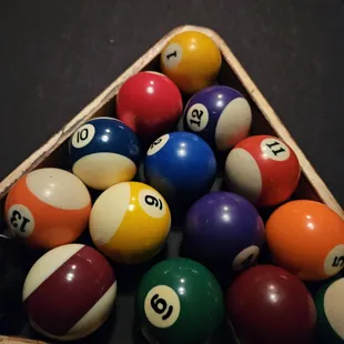 a pyramid of pool balls