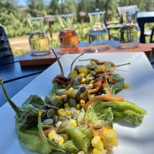 Flights and bites! Chef's Oven Roasted Shishito Peppers are delicious!