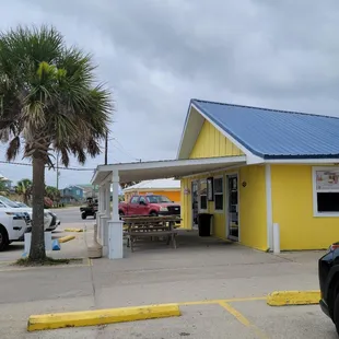 a car parked in front of the restaurant