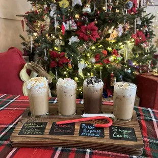 Iced latte flight, which includes a white chocolate English toffee latte, candy cane latte, polar express mocha and a sugar cookie latte