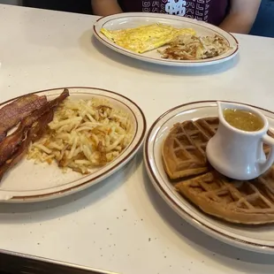Bacon, hashbrowns, sausage omelette, waffle with duck butter syrup