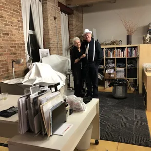 a man and a woman standing in a room