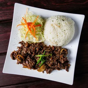a plate of beef and rice