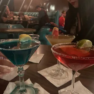 two cocktails on a table