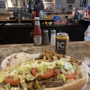 Cheesesteak hoagie &amp; fries with coleslaw