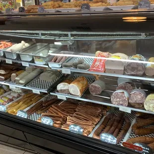 a display case filled with different types of pastries