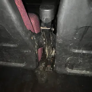 In between the seats . This is so disgusting im so surprised they are still in business. This is not sanitary !