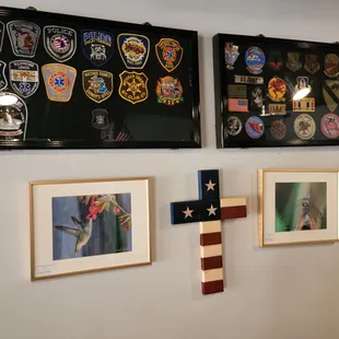 a cross and a wall of patches