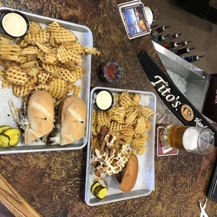 two trays of food on a table