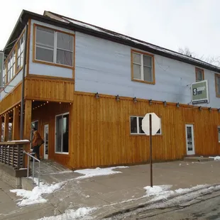 Outside of the building, view looking west towards the river.